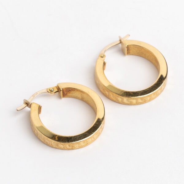 Aros argolla oro 18 kt labrado