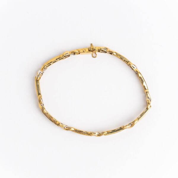 Pulsera brazalete oro 18 kt brillantes y zafiros naturales.