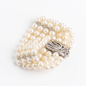 Pulsera brazalete perlas naturales oro 18 kt y brillantes.