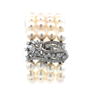 Pulsera brazalete perlas naturales oro 18 kt y brillantes.