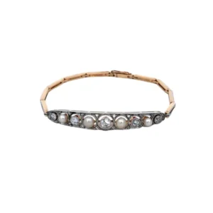 Pulsera brazalete oro 18 kt brillantes y perlas naturales.