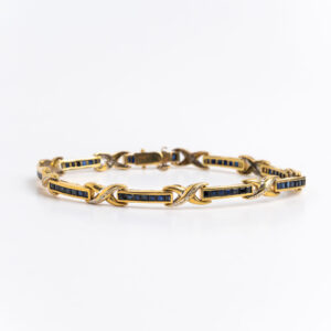 Pulsera brazalete oro 18 kt brillantes y zafiros naturales.
