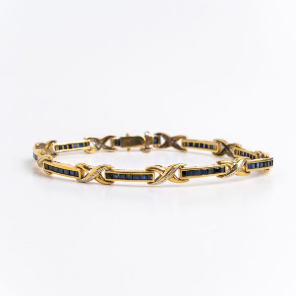 Pulsera brazalete oro 18 kt brillantes y zafiros naturales.