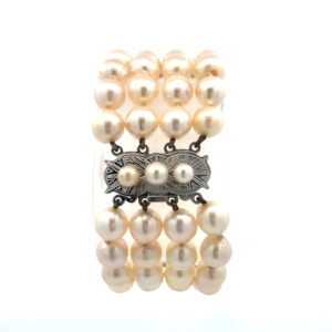 Pulsera Brazalete Perlas Naturales oro 18 kt y brillantes.