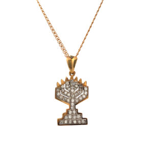 Cadena  Oro 18 kt y Dije candelabro 7 velas